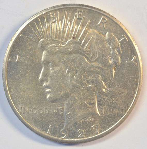 Fully struck BU 1927-P Peace Silver Dollar. Nice