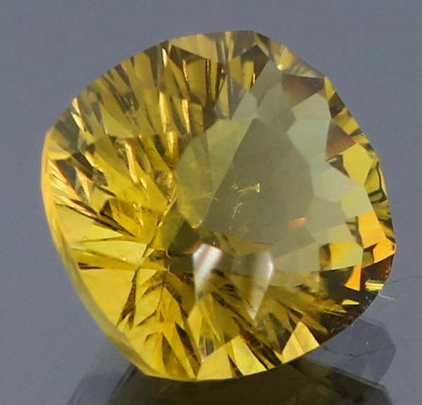 Hypnotizing 5.92ct concave cushion burnished gold Citrine