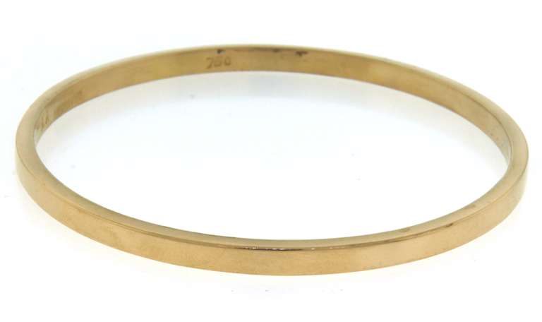 Memorable 18kt Pair of High Polish Bangles