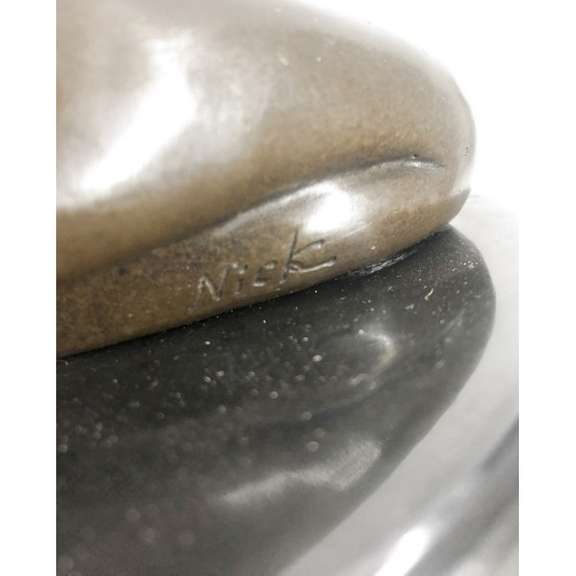 Sexy girl sitting with Pony Tail Bronze Sculpture