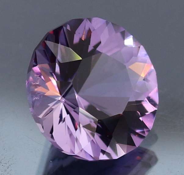 Exceptional 7.87ct color shifting Amethyst solitaire