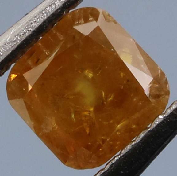 Rare .27ct emerald cut yellow Diamond