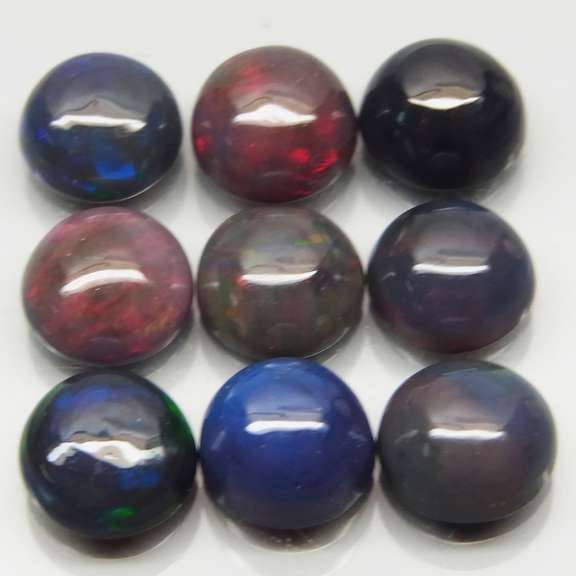 UNHEATED! 4.53ct Black Opal set with smoldering play of color