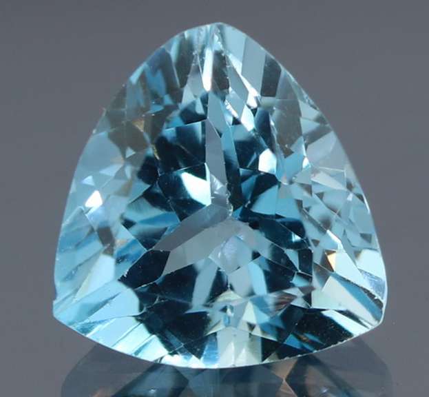 High fire 6.87ct trillion cut Swiss blue Topaz