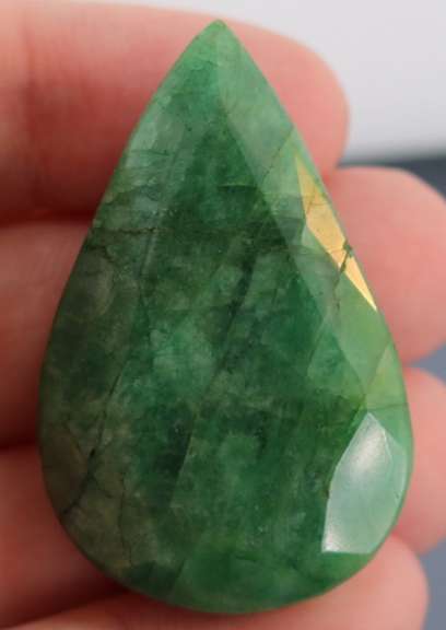 Large 108ct oval cut forest green Emerald