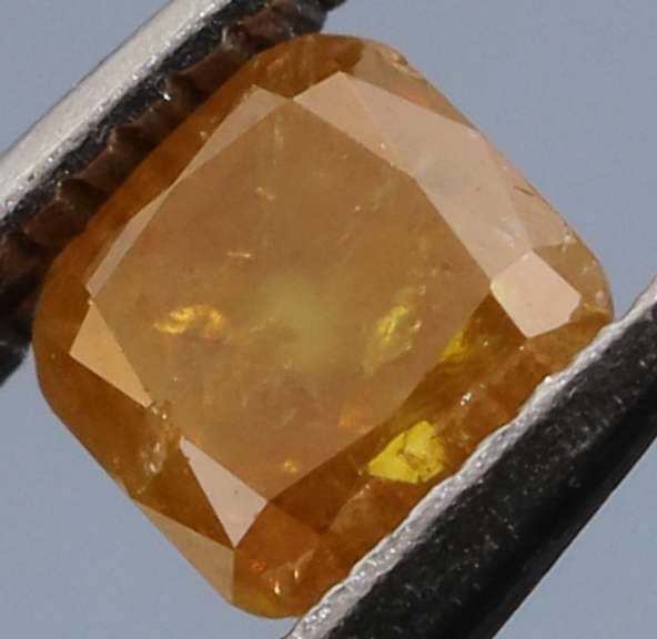 Rare .27ct emerald cut yellow Diamond