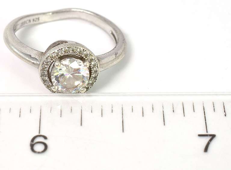 Glittering CZ Halo Ring in Sterling Silver
