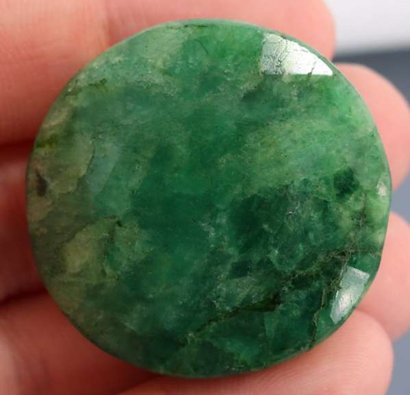 Large 165ct oval cut forest green Emerald
