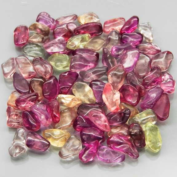 Unheated! 30.65ct fancy color Sapphire set