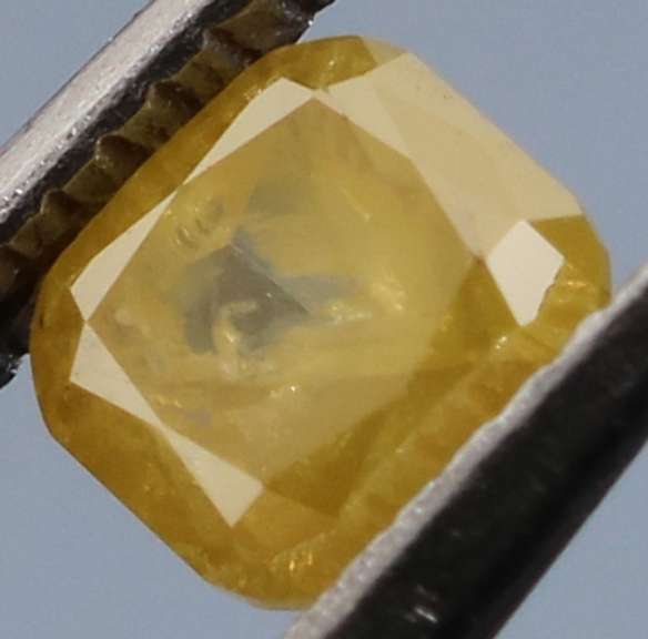 Rare .25ct emerald cut yellow Diamond