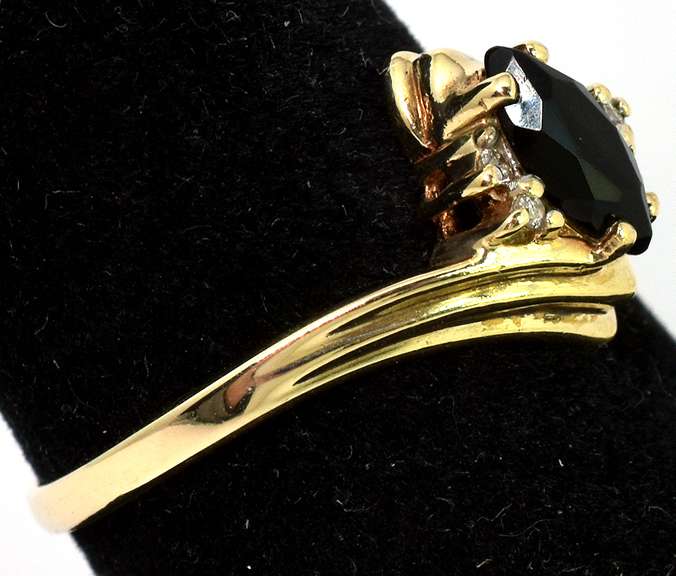 Mysterious Black Stone Ring with Diamond Accents in Yellow Gold