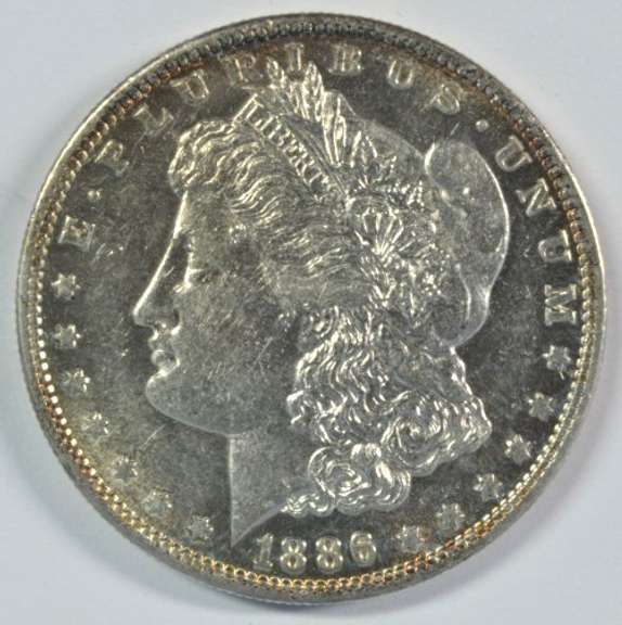 Original BU 1886-S Morgan Silver Dollar. Lustrous key date
