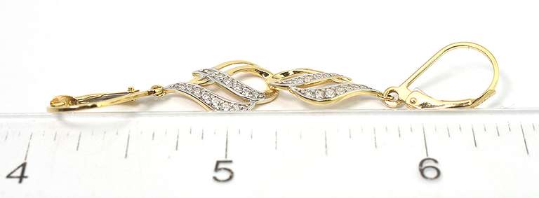 Sparkling CZ Dangle Earrings in 14KT Yellow Gold