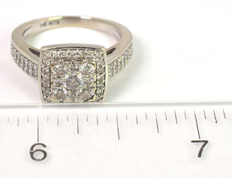 Striking 3/4CTW Diamond Halo Ring in 14KT White Gold