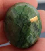 Large 97ct oval cut forest green Emerald