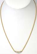 Breathtaking 3-Stone 0.90CTW Diamond Necklace in 14KT Yellow Gold