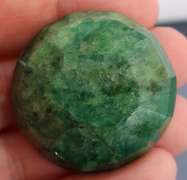 Large 165ct oval cut forest green Emerald