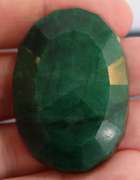 Large 152ct oval cut forest green Emerald
