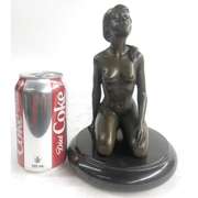 Sexy girl sitting with Pony Tail Bronze Sculpture