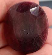 Fiery 134ct oval cut deep red Ruby