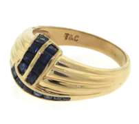 Graceful Blue Sapphire Criss Cross Yellow Gold Ring