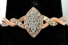 Endearing Twisting Diamond Ring in Rose Gold