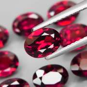 Amazing 11.41ct oval cut cherry red Garnet set