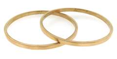 Memorable 18kt Pair of High Polish Bangles