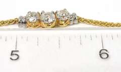 Breathtaking 3-Stone 0.90CTW Diamond Necklace in 14KT Yellow Gold