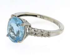 Romantic White Gold Blue Topaz Ring