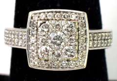 Striking 3/4CTW Diamond Halo Ring in 14KT White Gold