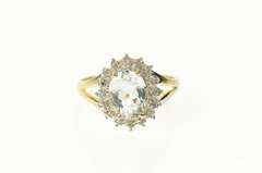 14K Yellow Gold Oval Blue Topaz Diamond Halo Cocktail Ring