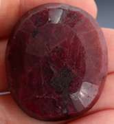 Fiery 134ct oval cut deep red Ruby