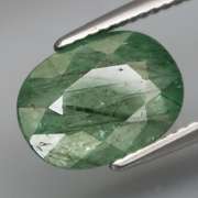 Captivating 3.54ct rutilated Emerald with a silver sheen!