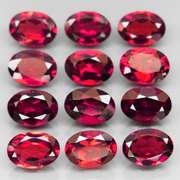 Amazing 11.41ct oval cut cherry red Garnet set