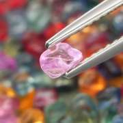 Amazing 24.20ct fancy color unshaped Sapphire set