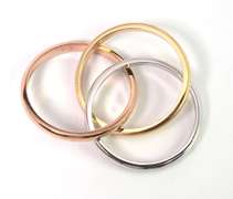 Intriguing Interlocked Rings in 3-Tone 14KT Gold