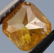 Rare .27ct emerald cut yellow Diamond