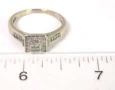 Sparkling 1/5CTW Diamond Halo Ring in White Gold