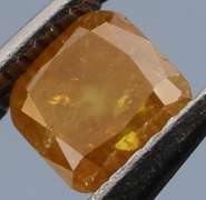 Rare .27ct emerald cut yellow Diamond