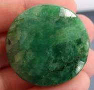 Large 165ct oval cut forest green Emerald