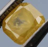 Rare .25ct emerald cut yellow Diamond