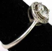 Glittering CZ Halo Ring in Sterling Silver