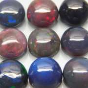 UNHEATED! 4.53ct Black Opal set with smoldering play of color