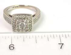 Striking 3/4CTW Diamond Halo Ring in 14KT White Gold