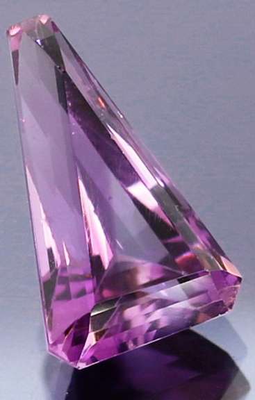 Outstanding 10.54ct custom trillion cut Amethyst