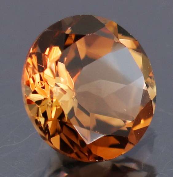 Rich red amber 2.20ct Imperial Topaz solitaire
