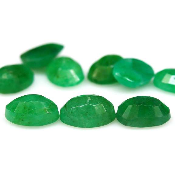 Deep green 9 piece 6.68ct Zambian emerald set