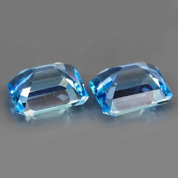 Stunningly well matched 11.95ct vibrant blue pair of Topaz