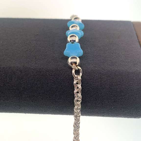 Sterling silver bracelet with light blue star charms and round silver beads